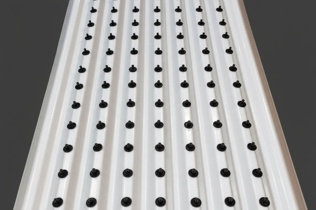 Galvanized corrugated metal with black screws